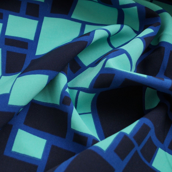 Креп барбі квадратів на бірюзовий фон